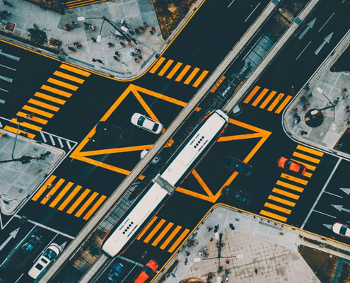 crossroads with train and cars