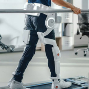 person walking with mechanical aid