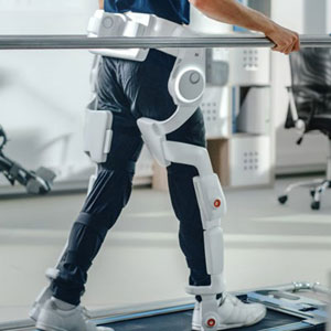 person walking with mechanical aid